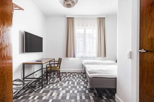 Et tv og/eller underholdning på Hotel Astoria, Best Western Signature Collection