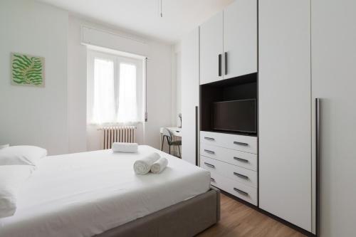 Ένα ή περισσότερα κρεβάτια σε δωμάτιο στο Corso Lodi Modern Apartment with Balcony