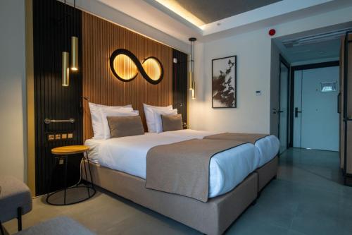 Postel nebo postele na pokoji v ubytování Ramada Resort by Wyndham Pamukkale Thermal