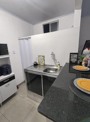 Dapur atau dapur kecil di Studio CG 3 - Campo Grande, RJ
