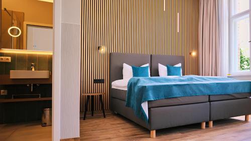 Katil atau katil-katil dalam bilik di H24 Hotel Apartments Eberswalde