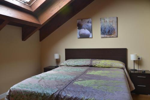 A bed or beds in a room at La Massana