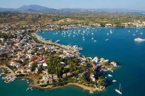 an aerial view of a harbor with boats in the water at Studio Villa Emeli, close to beaches and downtown in Porto Heli