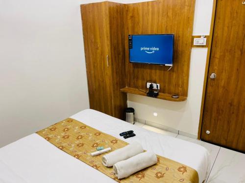 Cama o camas de una habitación en Hotel Avenue Sky