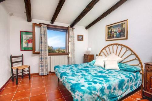 Ένα ή περισσότερα κρεβάτια σε δωμάτιο στο Villa Giuliana