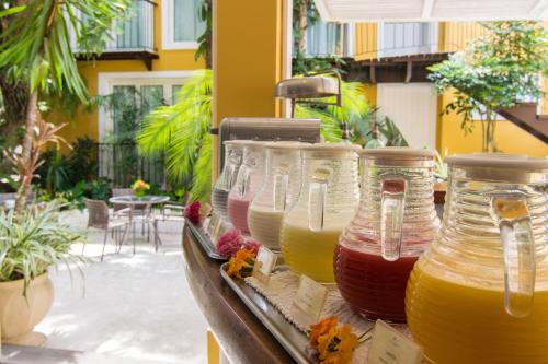 a group of jars of honey on a table at La Chimère Buzios Essence in Búzios