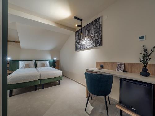 a bedroom with a bed and a flat screen tv at Craft Inn - Boutique Hotel in Sibiu