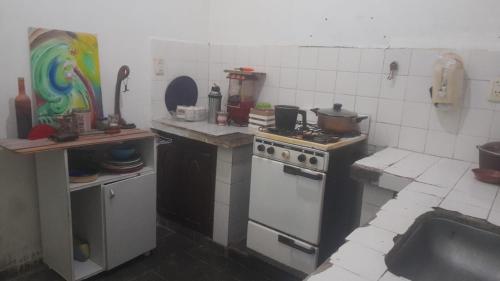 Kuchyň nebo kuchyňský kout v ubytování Casa Santiago