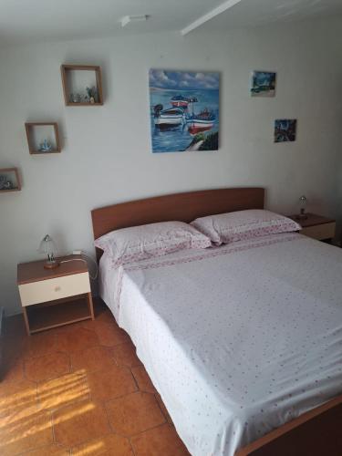 Ein Bett oder Betten in einem Zimmer der Unterkunft Appartamento Marina di Pisticci-Marconia