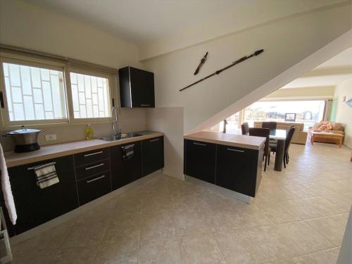 Η κουζίνα ή μικρή κουζίνα στο Surf House - Your Exclusive Getaway