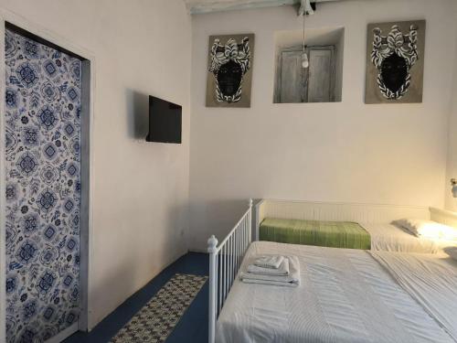 En eller flere senge i et værelse på da Massimo