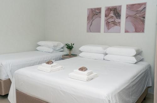 Postel nebo postele na pokoji v ubytování Castelo Palace Hotel