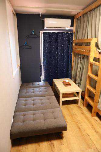 Guesthouse YOURSにあるベッド