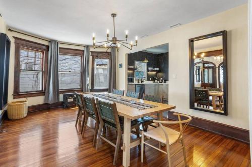 a dining room with a table and chairs at AC 9 BR 4BA Victorian Manor - 1 Block to Beach in Atlantic City