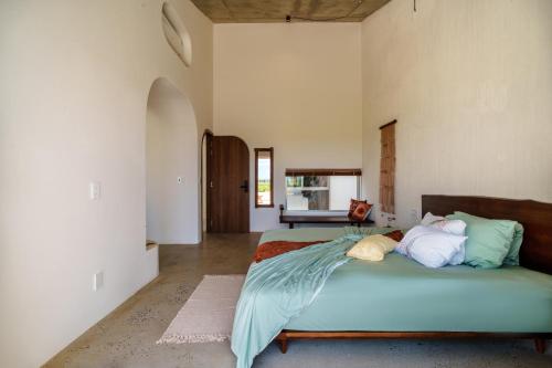 a bedroom with two beds in a room at Camfusion House in Hoi An