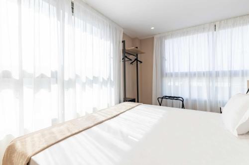 HQ Arena Hotelにあるベッド
