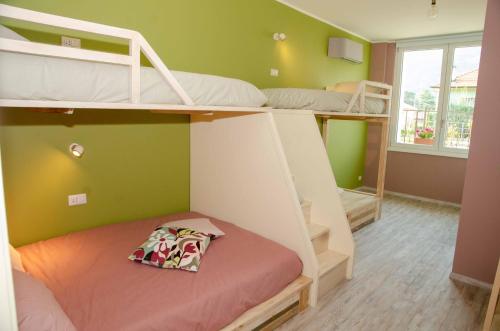 Postel nebo postele na pokoji v ubytování Magazzini Sasso Guest House