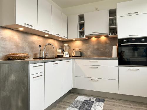 Dapur atau dapur kecil di Maisonette-Wohnung in Norderstedt