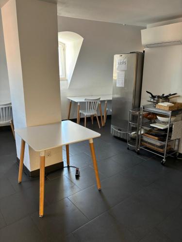 Coin salon dans l'établissement Be Lisbon Hostel Intendente