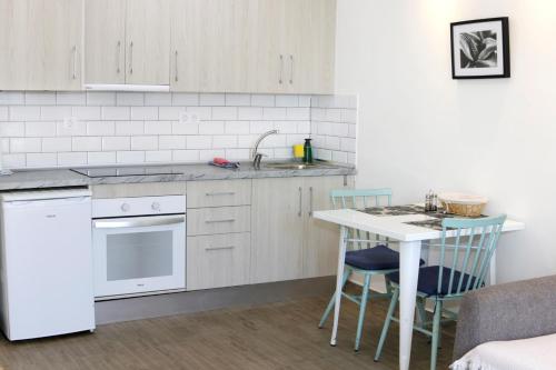 Η κουζίνα ή μικρή κουζίνα στο Apartamentos Juan Benítez