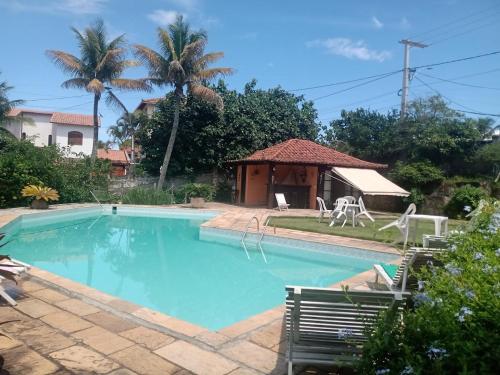 Πισίνα στο ή κοντά στο Vila Hibisco Pousada Saquarema