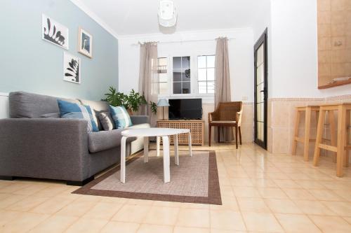 Χώρος καθιστικού στο Apartamentos Juan Benítez