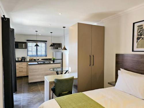 Kuchyň nebo kuchyňský kout v ubytování Hampton Collection Avenues - Urban 4 Sleeper Apartment
