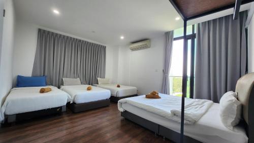 Ένα ή περισσότερα κρεβάτια σε δωμάτιο στο My Misto Homestay, Riverson Soho