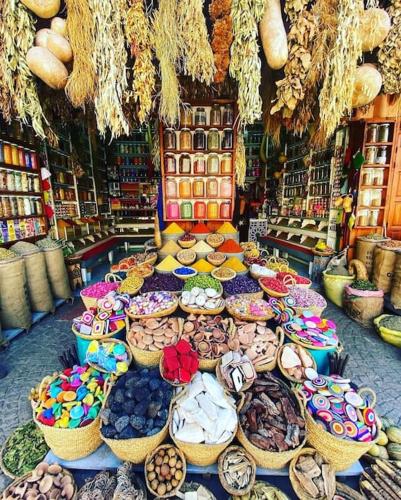 a store filled with lots of baskets of food at Villa Atlas Harmony Marrakech in Marrakech