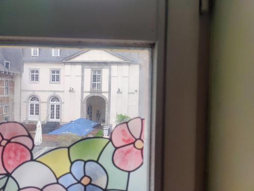 a view of a building from a window at KolMojen in Sint-Truiden