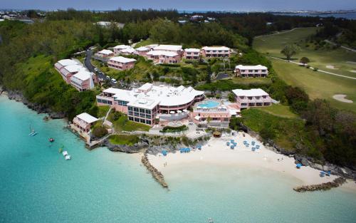 an aerial view of a resort with a beach at Pompano Beach Club in Southampton