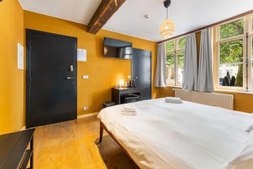 Ένα ή περισσότερα κρεβάτια σε δωμάτιο στο Lake Suites