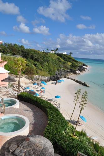 a view of a beach with a swimming pool at Pompano Beach Club in Southampton
