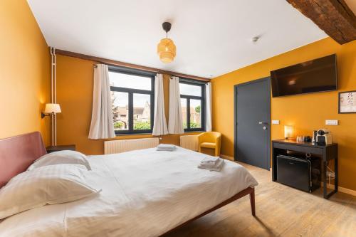 Ένα ή περισσότερα κρεβάτια σε δωμάτιο στο Lake Suites