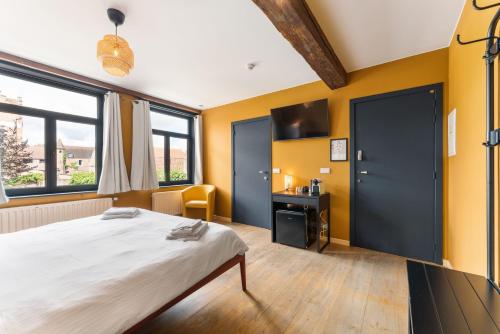 Ένα ή περισσότερα κρεβάτια σε δωμάτιο στο Lake Suites