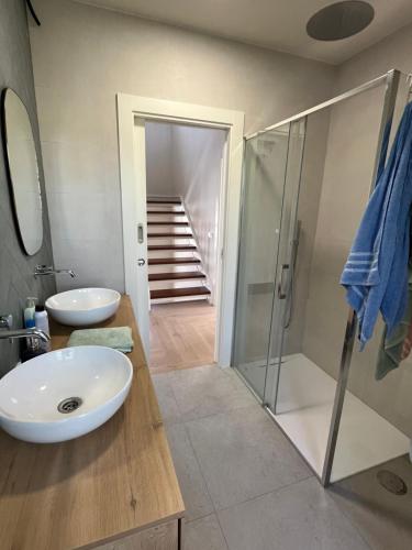a bathroom with a sink and a walk in shower at Espectacular casa en Salinas by BeBalmy in Salinas