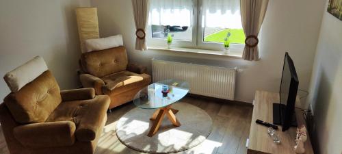 Posezení v ubytování Ferienwohnung Berghaus