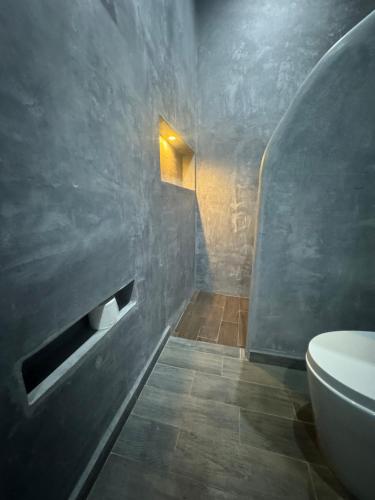 a bathroom with a sink and a toilet in it at Estudio Centrico Tulum in Tulum