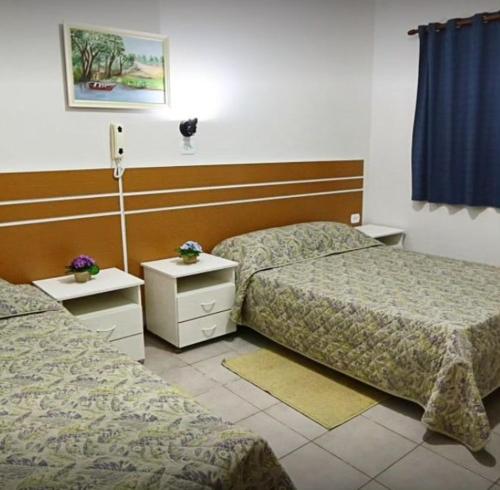 Postel nebo postele na pokoji v ubytování Hotel Xapuri