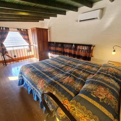 Letto o letti in una camera di Cabañas La Ponderosa