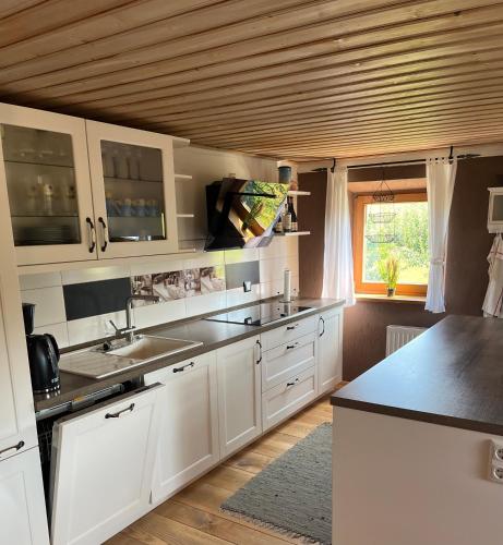 Kuchyň nebo kuchyňský kout v ubytování Ferienwohnung Metzner