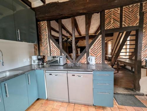 Dapur atau dapur kecil di Gîte Familiale en pleine forêt