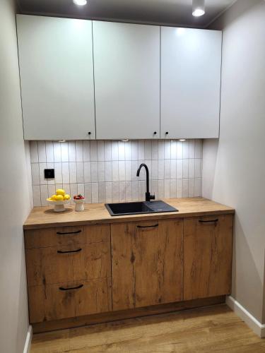 Η κουζίνα ή μικρή κουζίνα στο Apartamenty K17 Stare Miasto