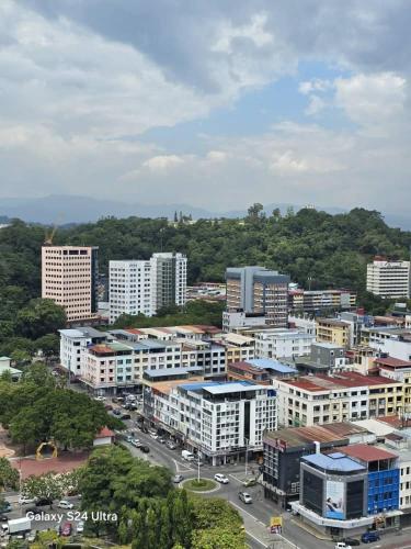 an aerial view of a city with buildings at The Shore Home Suites Kota Kinabalu City Sabah Center in Kota Kinabalu