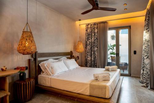 Ένα ή περισσότερα κρεβάτια σε δωμάτιο στο Paragon Suites 3