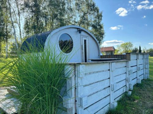 a dome house on top of a fence at Residence R&R in Karvys