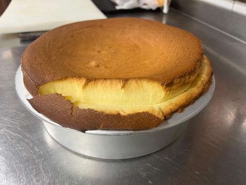 a cake sitting in a pan on a table at LA CASONA DE PALMIRA in Caín