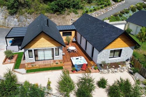 an aerial view of a house with a patio at Le chalet Paula in Agos-Vidalos