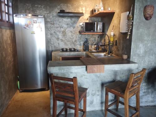 Una cocina o cocineta en Enseada do Gancho - Aluguel de Lofts e Espaços para Eventos e Casamentos
