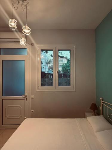 Una cama o camas en una habitación de Zante Heart 1 Bedroom Apartment